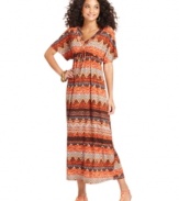 Make a bold statement in One World's maxi dress, featuring an allover mixed print and flattering silhouette.