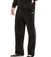 Kick back and greet the weekend in style with the ultimate comfort of these plush velour track pants from Puma.