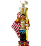 Show support for troops past and present with the We Salute You ornament, featuring a toy soldier at attention in handcrafted glass. A meaningful gift from Christopher Radko.