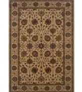 A lush, naturalistic motif teeming with beautifully detailed palmettes and meandering vines infuses your home with old-world sophistication. Woven from super soft polypropylene for superior stain resistance and durability, this magnificent area rug from Sphinx will maintain its lush texture and rich coloration for years to come. (Clearance)