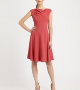 Ultra-feminine, this cap-sleeve dress with a draped neckline and flattering seams is an undeniable must-have. Draped necklineCap sleevesIntriguing seamsConcealed back zipperAbout 24 from natural waist70% viscose/28% virgin wool/2% elastaneDry cleanImported of Italian fabric Model shown is 5'9½ (176cm) wearing US size 4. 