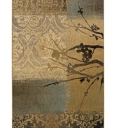 A flourish of florals and a collage of shapes are layered for gorgeous dimension in this stunning area rug from Sphinx. Woven of durable, long nylon fibers that also offer a soft hand, it serves to enliven any space with a rich, luxurious color palette.