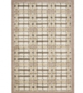 A traditional basketweave plaid is updated for the modern home in this area rug only from Martha Stewart rugs. Hand tufted in India of long wool fibers, this luxurious home accent presents unparalleled comfort and style underfoot.