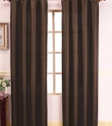 Simple yet stylish, these solid faux silk window panels make a lavish statement in any room. Distinctive hues, each with a subtle sheen, exude a decidedly luxe appeal, imparting a sense of refinement and sophistication. Polyester.