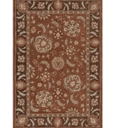 A beautifully detailed motif teeming with lush botanicals enlivens your home with old-world grandeur. Hand tufted in densely woven polyester and acrylic, this plush area rug from Dalyn will maintain its subtle coloration and rich texture for years to come.