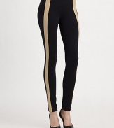Keep it comfy in these urban-cool leggings with contrasting leather trim and an elastic waistband. Elastic waistbandMedium rise, about 8Inseam, about 30Body: 86% nylon/14% spandexTrim: LeatherDry clean with leather specialistMade in USA of imported fabricModel shown is 5'10 (177cm) wearing US size Small.