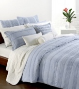 Slip into something a little more comfortable. Crafted from men's shirting material and garment washed for extra softness, this Pure DKNY Innocence Stripe duvet cover features cotton voile yarn-dyed stripes with mini-ruffles. Button closure.