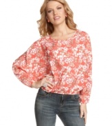 Give your favorite skinny jeans a graphic boost with this pretty abstract print top from Jessica Simpson!