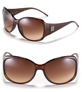 Sleek rectangle sunglasses with soft edges and signature logo detail at temples.