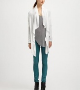 From the HELMUT capsule collection. Whisper-weight jersey cardigan with a draped front pairs perfectly with your favorite colored skinnies. Open draped frontLong sleevesRuched cuffsAbout 34 from shoulder to hem80% modal/20% nylonDry cleanMade in CanadaModel shown is 5'9 (176cm) wearing US size Small.