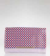 DIANE von FURSTENBERG's woven clutch is a cool-girl's after-hours accessory of choice. In a bold color way and oversized shape, it makes a statement worn with denim or dresses.