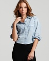 A modern rendition of the classic button-down, this cropped Patterson J. Kincaid shirt features three chest pockets--a single key pocket and two flap patch pockets with VELCRO® closures.