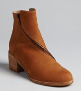 Eileen Fisher zips into the booties trend in this well-crafted style, featuring decorative zippers around each shaft.