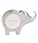 Remember his or her wildest moments in this Jungle Parade picture frame from Reed & Barton. A silver-plated elephant with cheery orange accents is a gift that'll please parents and kids alike.