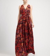 Inspired by Grecian style, a mesmerizing silk gown with an unforgettable print.V-necklineLong sleevesSelf beltPleated full skirtKeyhole backAllover printAbout 45 from natural waistSilkDry cleanImportedSIZE & FIT Model shown is 5'9 (175cm) wearing a US size 4. 
