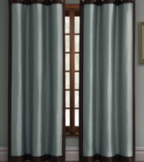 Boasting a two-toned shimmering design, the Peyton window panel offers a tailored look with its broad grommeted header and a touch of luxe dimension in its coordinating colors. Simple, yet sophisticated, this panel works well in any setting.