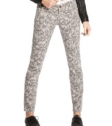 Join the graphic denim movement with Material Girl's five-pocket, feather-print skinny jeans!