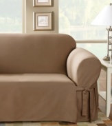 The simple sophistication of modern design is captured in these durable, pure cotton slipcovers. Made from dense cotton duck, they'll stand up to what life dishes out, and they'll get softer and more inviting wash after wash. Coordinating accent pillows add a tailored look. Straight skirt. Fits loveseats measuring 40-73 from outer arm to outer arm. Machine washable. Dyed for deep rich tones, colors should be line dried; Natural is tumble dry.