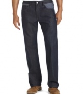 Levi's denim is in the details: Here, 569 Loose Straight Anvil jeans in dark indigo denim feature railroad-stripe fabric insets to highlight the classic five-pocket styling.