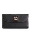 Dooney & Bourke's sophisticated leather continental wallet shows off its organization skills in style.