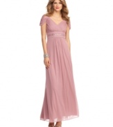 A Grecian-inspired silhouette lends timeless elegance to this dress by Alex Evenings. The empire waist and crossover V-neck flatters and elongates.