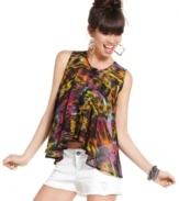 A burst of blazing colors makes this sheer, asymmetrical blouse from Material Girl a killer choice for every day style!