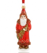 Gilded in a Gaelic sash of red and green, this glass ornament from Vaillancourt offers a historic take on the lovable gift-giving Santa Clause of present day. Delicately crafted with beaded and sparkling details for a brilliant addition to any Christmas tree.