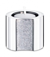 The Ambiray candle holder from Swarovski presents sleek, stainless steel heightened with dozens of tiny faceted clear crystals, creating a home accent that truly radiates glamour and sophistication.