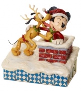 This year, even the mouse is stirring. Santa passes his hat to Mickey and Pluto in this darling Disney scene, which shows old friends taking Christmas spirit to new heights.