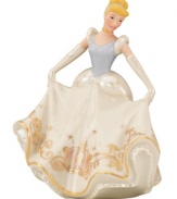 With her long gloves, flowing gown and baby-blue headband, Cinderella waltzes into your home with enchanting beauty. The Disney figurine's magnificent porcelain skirt is embellished with the scene of her escape, featuring the magic pumpkin coach in dazzling 24-karat gold. Qualifies for Rebate