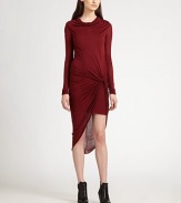 An elegantly knotted front adds sophisticated style to this draped jersey go-to with an asymmetrical hem. Draped mock turtleneckDropped shouldersLong sleevesTwisted front with gathered knotAsymmetrical hemAbout 34 from natural waistMicromodalDry cleanImportedModel shown is 5'10 (177cm) wearing US size Small.