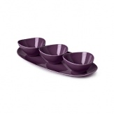 This fashion-forward porcelain dinnerware has signature DVF style - bold, unique, modern. The highly glossed surface, intentionally irregular curves and exposed seams create a chic tablescape and offer infinite styling possibilities. Mix and match with other colors in the Pebblestone collection to create your own signature look.