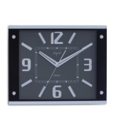 A study in smart design, this Opal Clocks timepiece boasts clean lines and classic numerals on a charcoal dial. Watch the clock's second hand but, thanks to noiseless movement, never hear it tick.