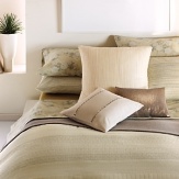Subtle beiges and nudes are woven together creating a variety of textures and patterns. Coordinates with the Sprig Floral Sheets, shadowed branches layered on top of each other, and the Double Row Percale Sheets in Straw. Also coordinates with the Double Weave Blanket in off white. The decorative pillows add texture and glamour.