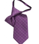 Etched in silk. This grid tie from Calvin Klein will give his buttoned-up look a classic finish with a simple zip closure.