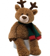 Ready for a ride on Santa's sleigh, this lovable, huggable teddy bear from Gund wears Rudolph's antlers and a holiday scarf.