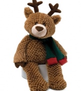 Ready for a ride on Santa's sleigh, this lovable, huggable teddy bear from Gund wears Rudolph's antlers and a holiday scarf.