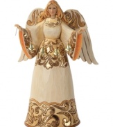 Full of great joy, this angel welcomes the Christmas spirit into your home. While striking gold and cream hues dance across her robe & wings, her calm expression & peaceful countenance create an undeniable warmth.