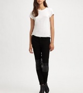 Coolest way to work the trend, these supremely soft skinnies finish the look with lustrous leather paneling. THE FITMedium rise, about 8Inseam, about 33THE DETAILSButton closureZip flyLeather panelingFive-pocket styleFully lined37% rayon/37% cotton/24½% Tencel/1½% LycraDry clean with leather specialistImportedModel shown is 5'11 (178cm) wearing US size 4.