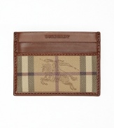 A handsome credit card case is adorned with a check-print panel that's treated further with Burberry's signature equestrian knight logo for a double dose of iconic style.