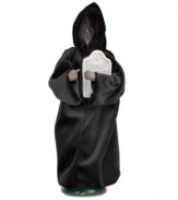 The future is grim for Ebenezer Scrooge, if he doesn't change his miserly ways. With his tombstone in-hand, this Spirit of Christmas Future figurine is a stern warning for grumbling holiday haters.
