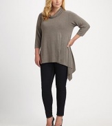 Comfort and style come together in this stylish design. Draped neck Three-quarter length sleeve Pull-on style About 30 from shoulder to hem 95% viscose/5% spandex Hand wash Imported 