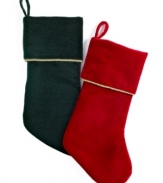 A perfect fit. Simple velvet Christmas stockings with a rolled cuff trimmed in gold cord provide reliable, understated elegance from one holiday to the next.