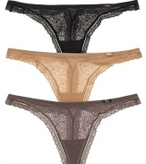 This stretchy mesh thong from Calvin Klein features a thin lace waistband and scalloped lace trim. Style #D3452.