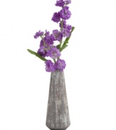 Back to basics. The Toya vase from Design Ideas has the look of stone in textured gray ceramic, offering chic contrast to delicate blooms.