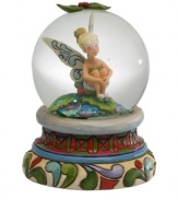 In time for the holidays, Tinkerbell, a much loved Disney character, is presented by Jim Shore as a charming snow globe with folk art-inspired details.