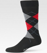 The luxury house's essential addition to every well-appointed wardrobe in silky, argyle-patterned wool. Mid-calf height90% wool/10% nylonMachine washMade in Italy