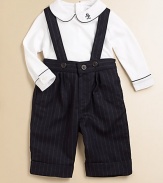 This essential set pairs a classic pinstripe overall with a soft cotton jersey bodysuit. Bodysuit Twill club collarLong sleeves with barrel cuffsBack buttonsBottom snaps Overall Adjustable shoulder strapsFront and back strap closuresCuffed hemCottonMachine washImported Please note: Number of buttons/snaps may vary depending on size ordered. 