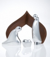 This heartfelt nativity scene stands with graceful dignity on any tabletop. In Nambe's signature smooth metal alloy with rustic wooden accents, of the birth of baby Jesus is cast with timeless wonder. A collectible, limited edition piece from Nambe, designed by Todd Myers. Creche measures 10 x 8.5.