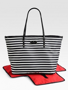A chic, striped baby bag with matching changing pad that makes mommy look stylish and sophisticated.Double top handles, approximately 10 dropSpring clip strap top closeStroller clipsOne inside open pocketOne inside zip pocketBright, wipe-clean liningJersey-backed nylon with patent leather trim12½W X 14¾H X 7DImported